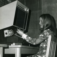 Student on Blackwell Library microfilm reader, circa 1969